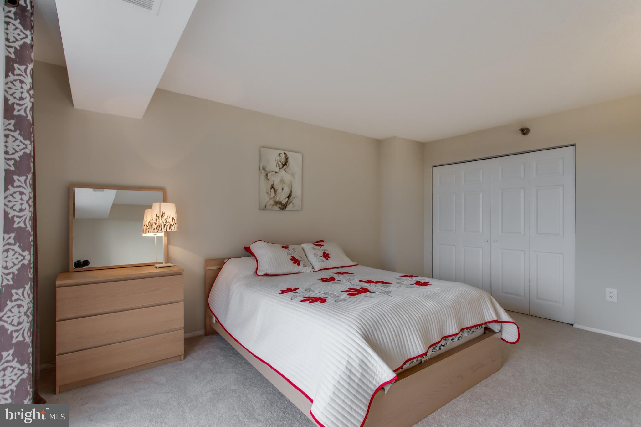 1808 Old Meadow Road, Unit 1012 McLean, VA 22102 - Photo 27 of 62 Serene bedroom with soft, inviting decor.