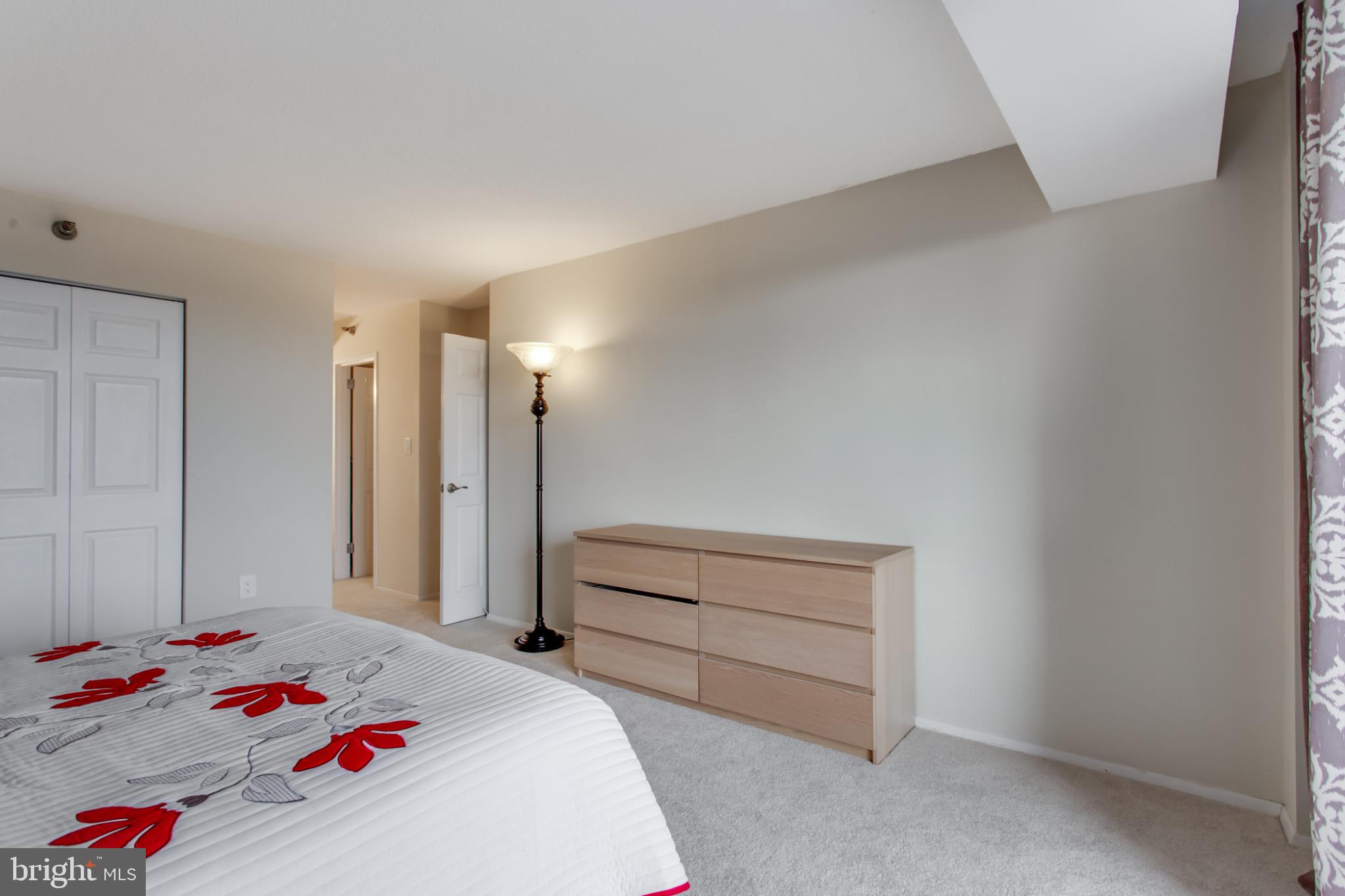 1808 Old Meadow Road, Unit 1012 McLean, VA 22102 - Photo 28 of 62 Bright and airy bedroom with modern accents.