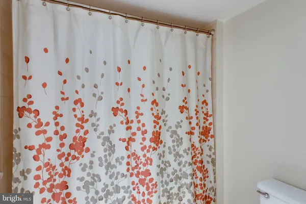 a view of a chairs and table in the balcony