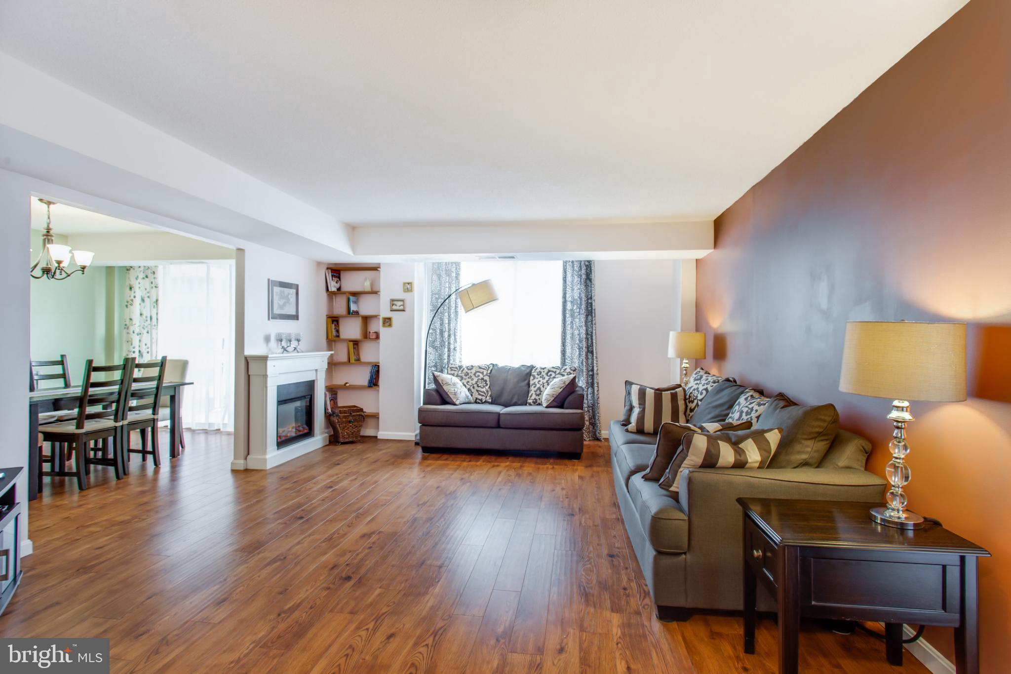 1808 Old Meadow Road, Unit 1012 McLean, VA 22102 - Photo 31 of 62 Spacious living area with warm accents.