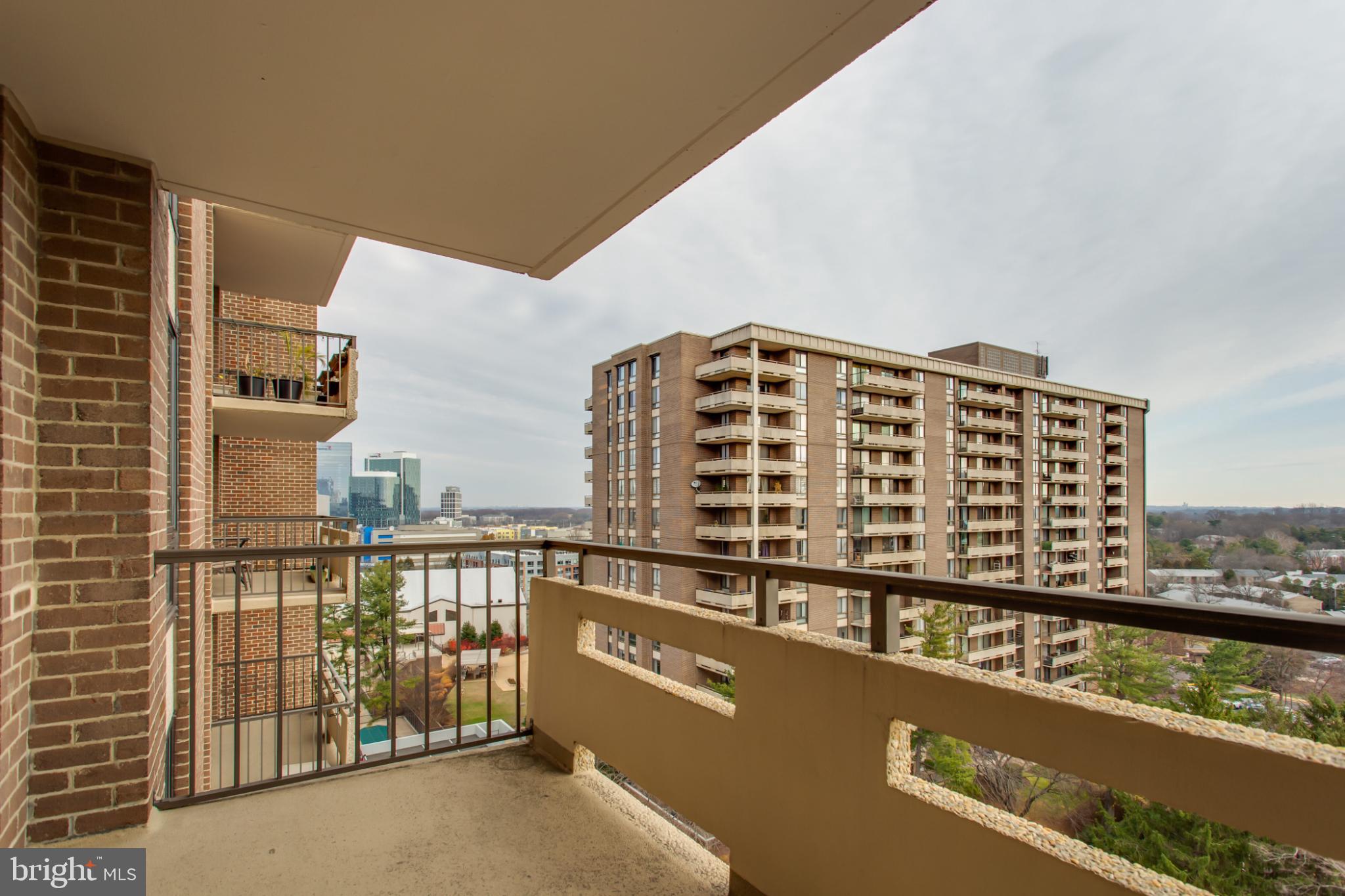 1808 Old Meadow Road, Unit 1012 McLean, VA 22102 - Photo 37 of 62 Urban balcony with city skyline views.