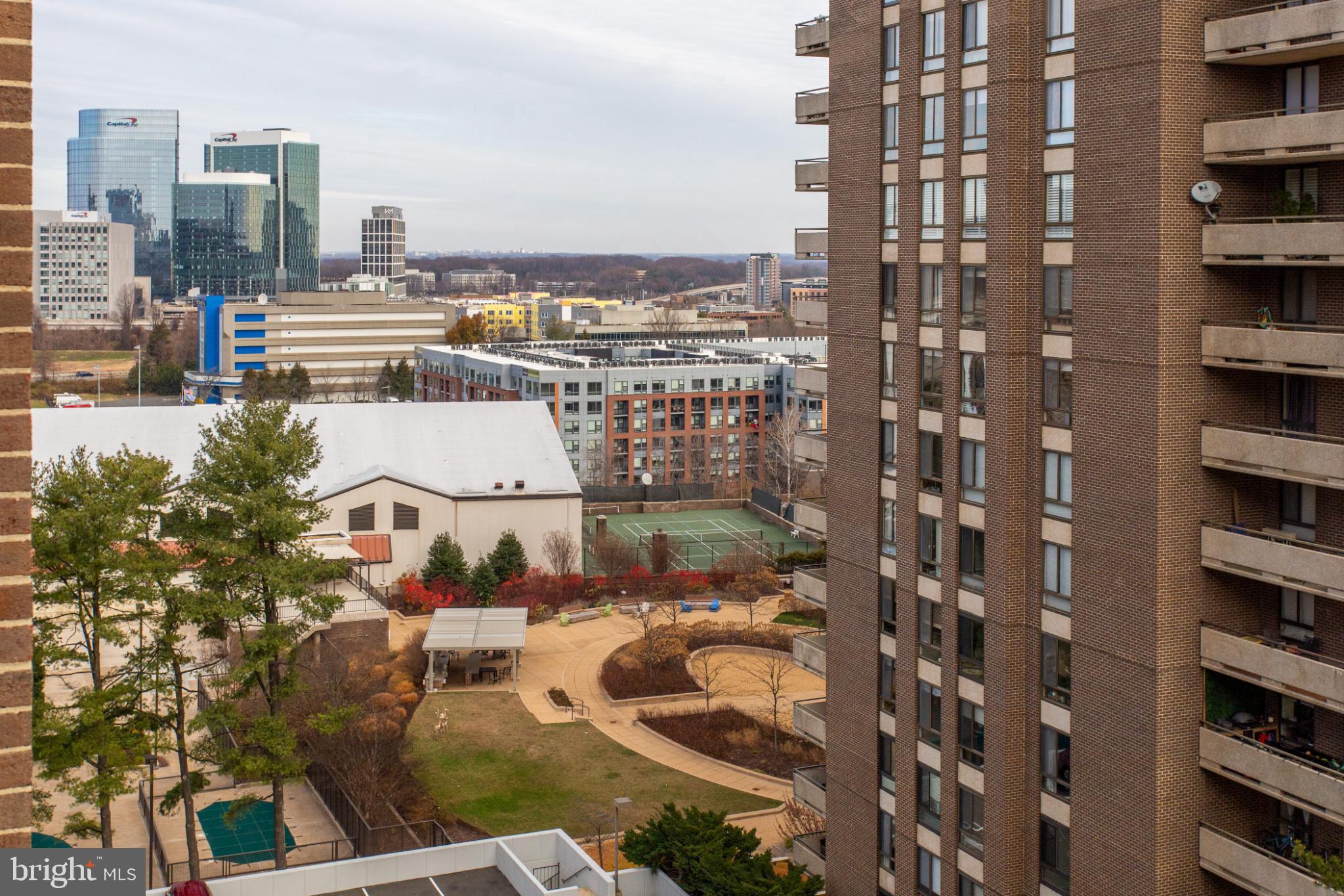 1808 Old Meadow Road, Unit 1012 McLean, VA 22102 - Photo 38 of 62 Urban skyline meets serene green spaces.