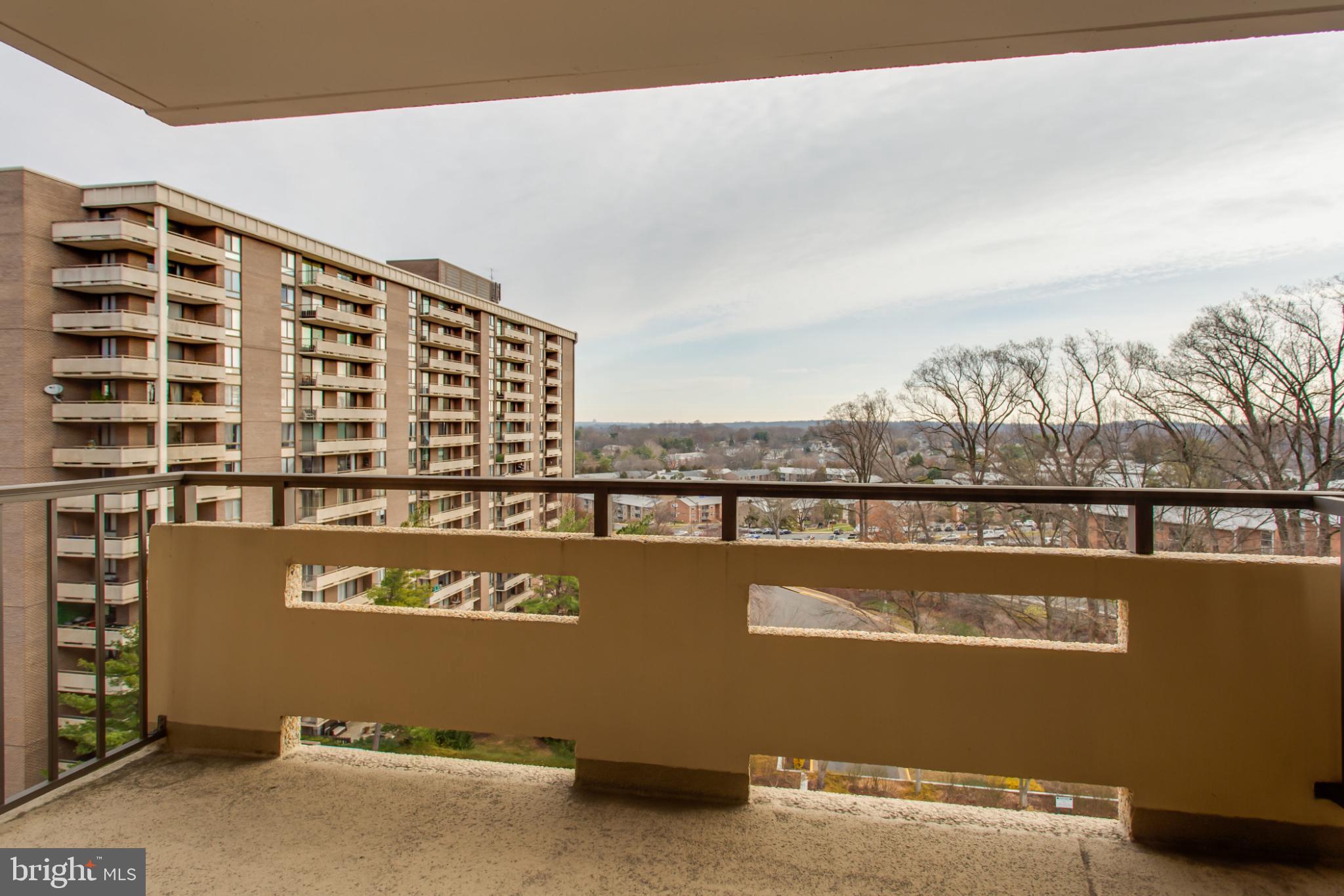 1808 Old Meadow Road, Unit 1012 McLean, VA 22102 - Photo 39 of 62 Spacious balcony with urban skyline views.