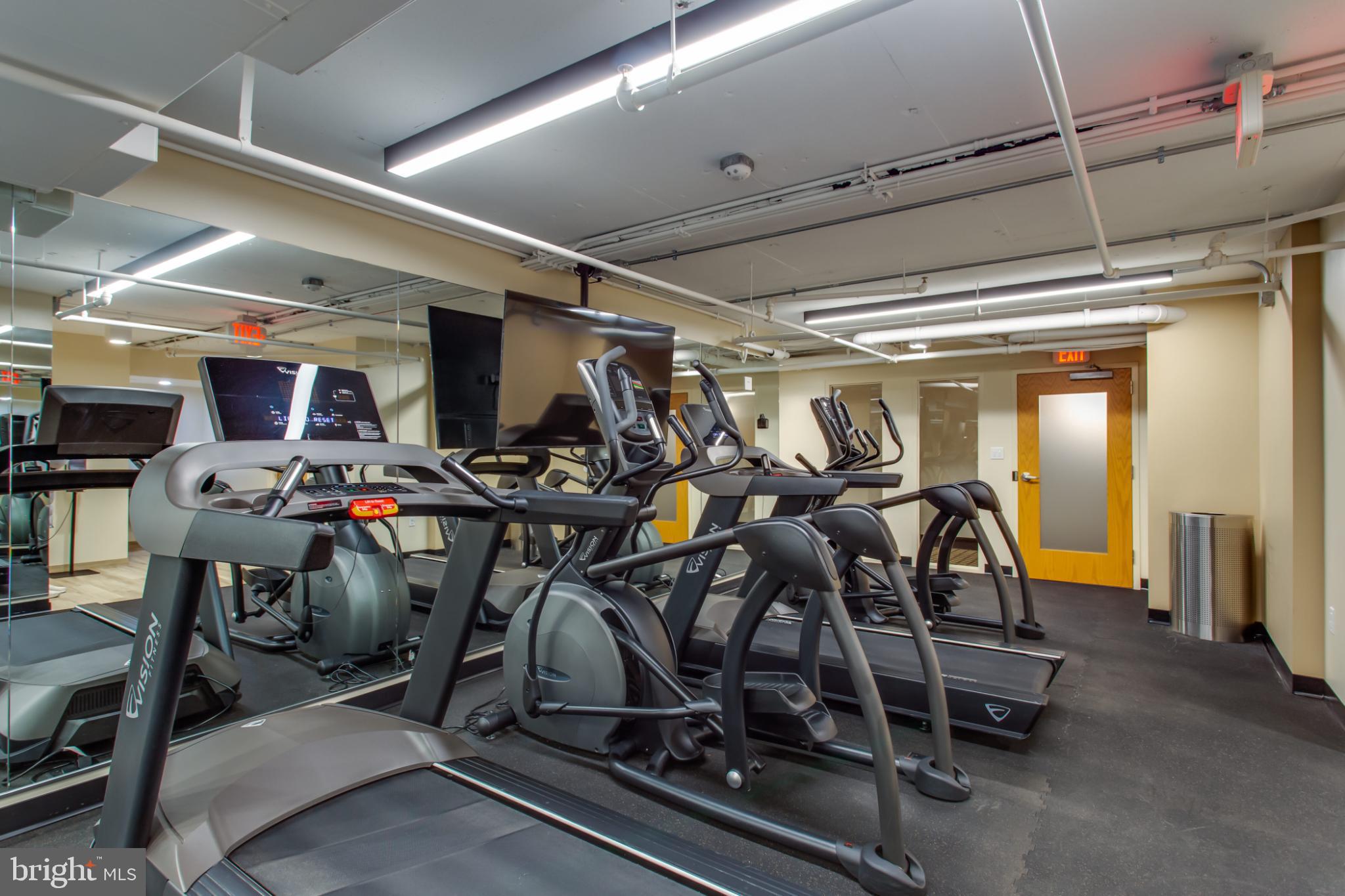 1808 Old Meadow Road, Unit 1012 McLean, VA 22102 - Photo 48 of 62 Modern fitness center with sleek equipment.