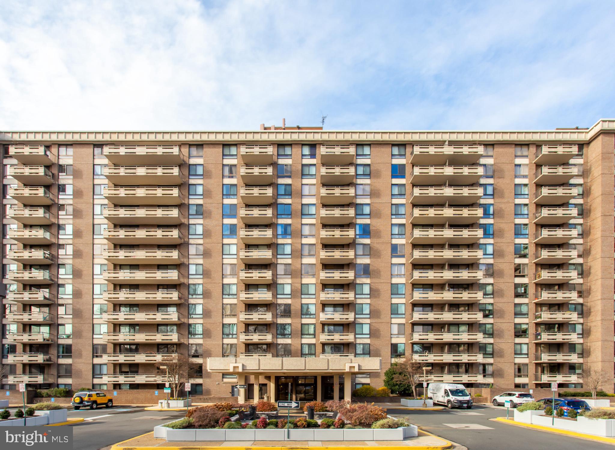 1808 Old Meadow Road, Unit 1012 McLean, VA 22102 - Photo 53 of 62 Modern apartment building with inviting entrance.