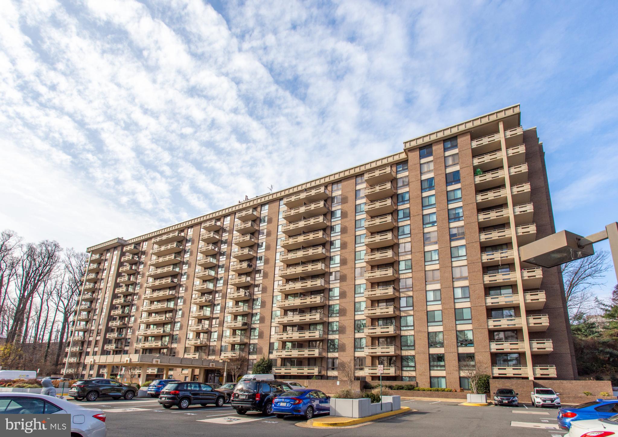 1808 Old Meadow Road, Unit 1012 McLean, VA 22102 - Photo 54 of 62 Modern apartment building with scenic views.
