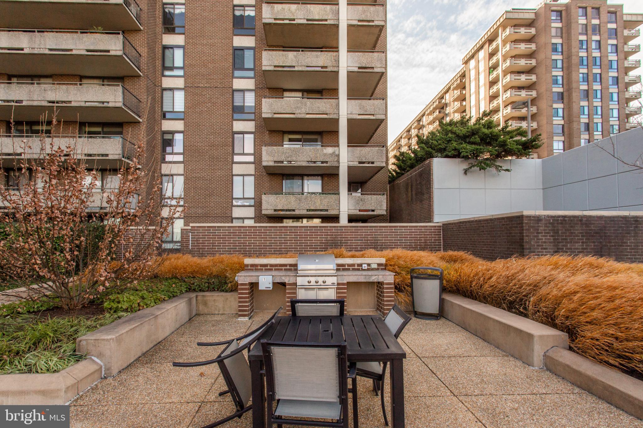 1808 Old Meadow Road, Unit 1012 McLean, VA 22102 - Photo 55 of 62 Urban oasis with grilling space and greenery.