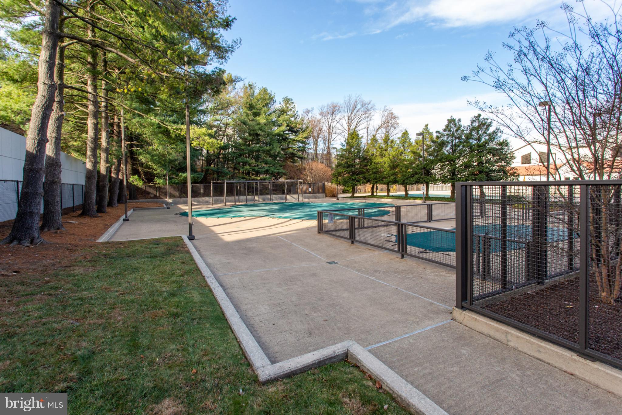 1808 Old Meadow Road, Unit 1012 McLean, VA 22102 - Photo 57 of 62 Serene outdoor space with tennis courts.