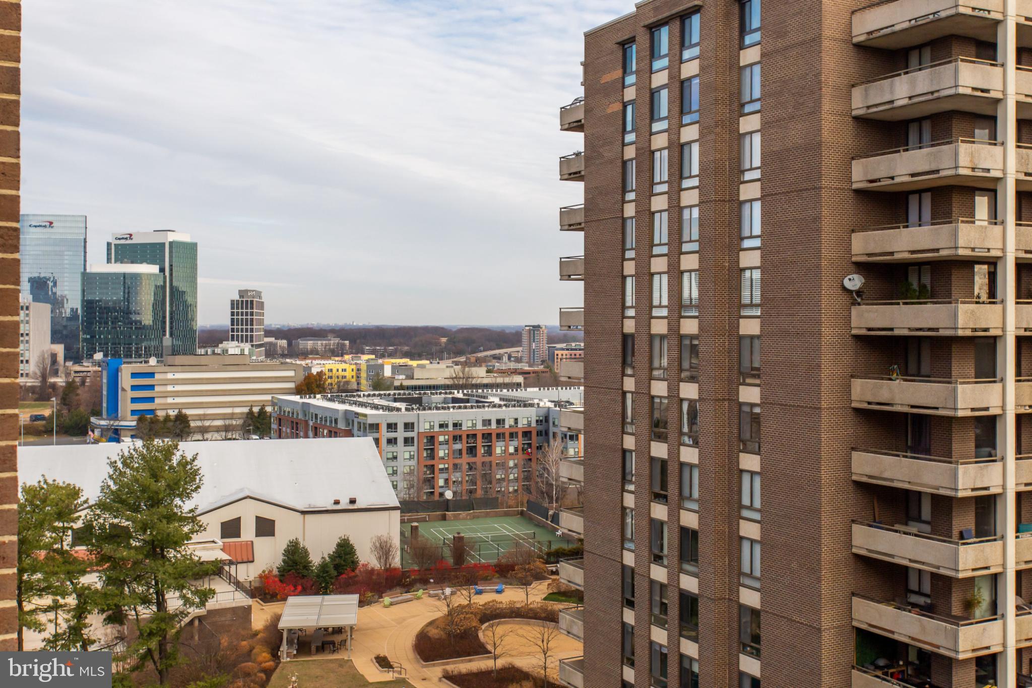 1808 Old Meadow Road, Unit 1012 McLean, VA 22102 - Photo 62 of 62 Urban skyline with modern architecture.