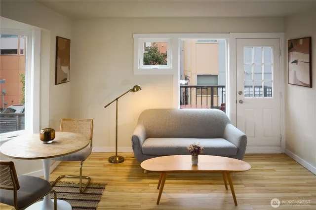 a living room with furniture and a window