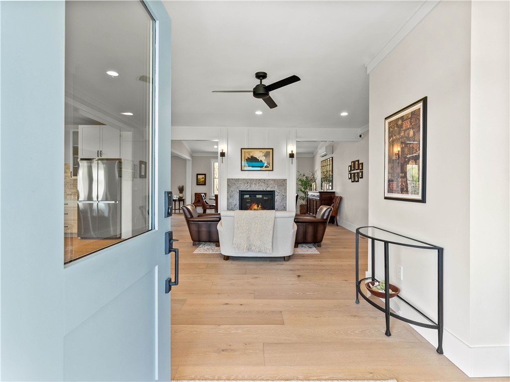 331 Bakerville Road Easley, SC 29642 - Photo 7 of 43 This inviting space features a welcoming entry, an open living area, and bright, warm hardwood floors.