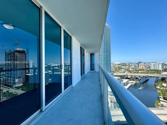 a view of city with tall buildings
