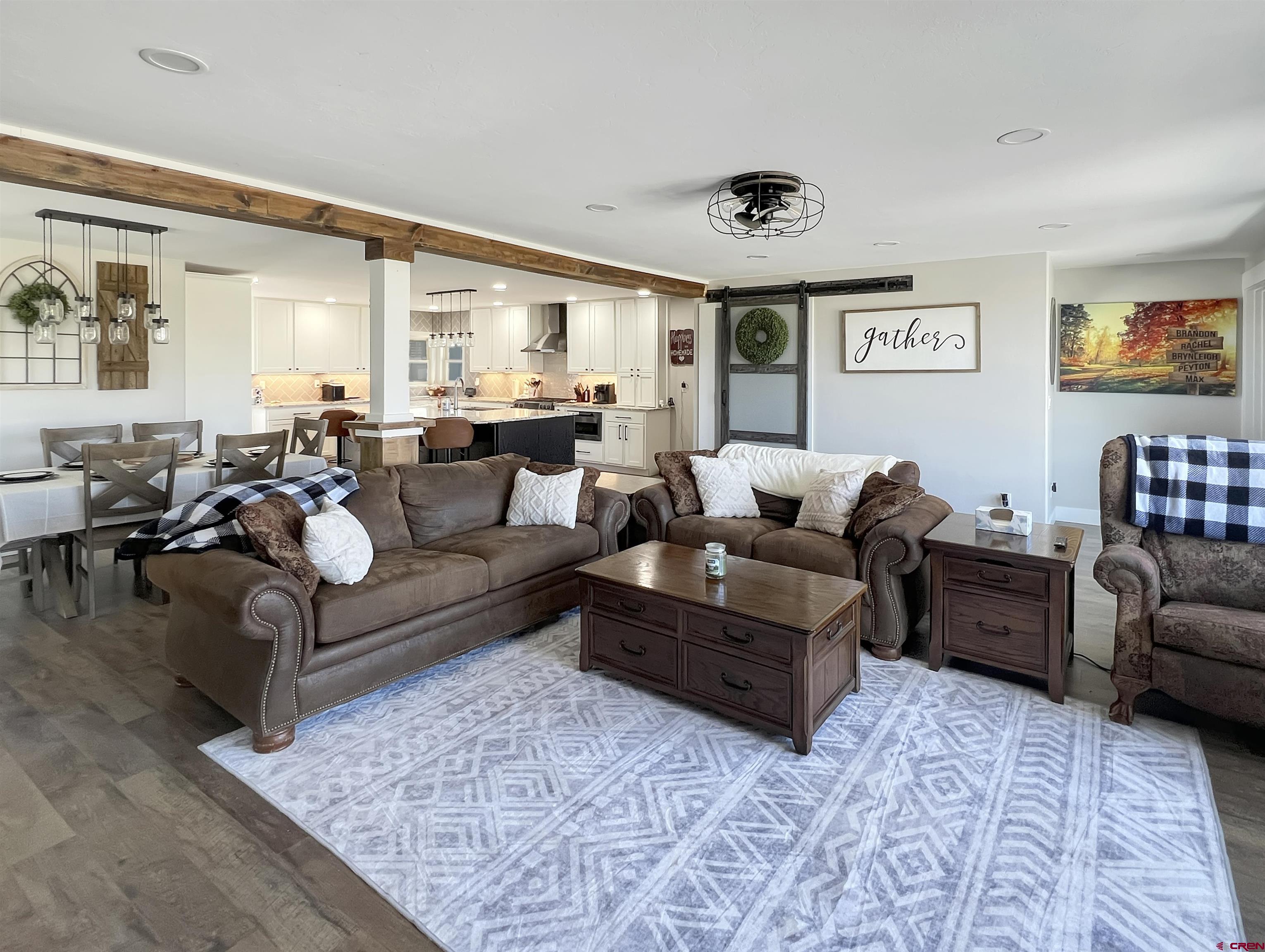 14332 G Road Delta, CO 81416 - Photo 6 of 35 a living room with furniture or couch and a window