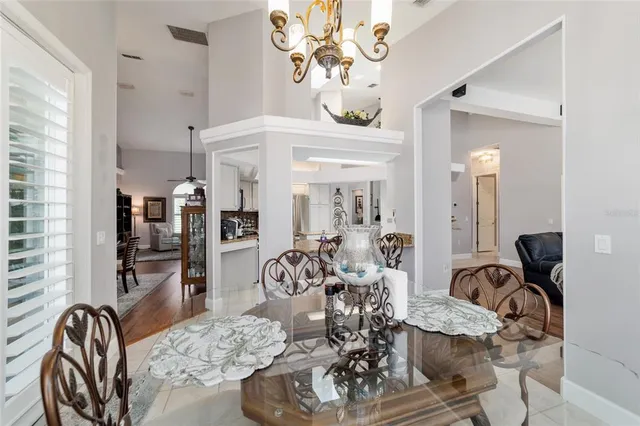 a view of a hallway with wooden floor and closet