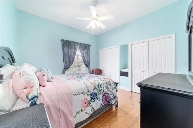 a view of a backyard with swimming pool