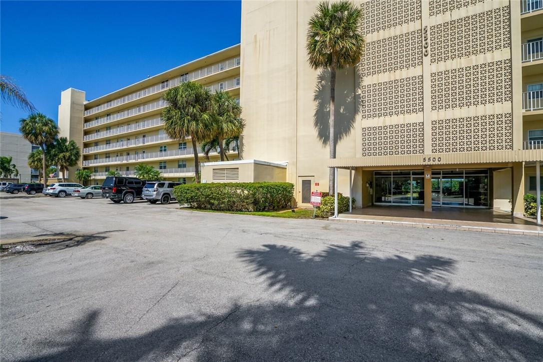 5500 Northwest 2nd Avenue, Unit 119 Boca Raton, FL 33487 - Photo 21 of 22 a front view of a building with a road
