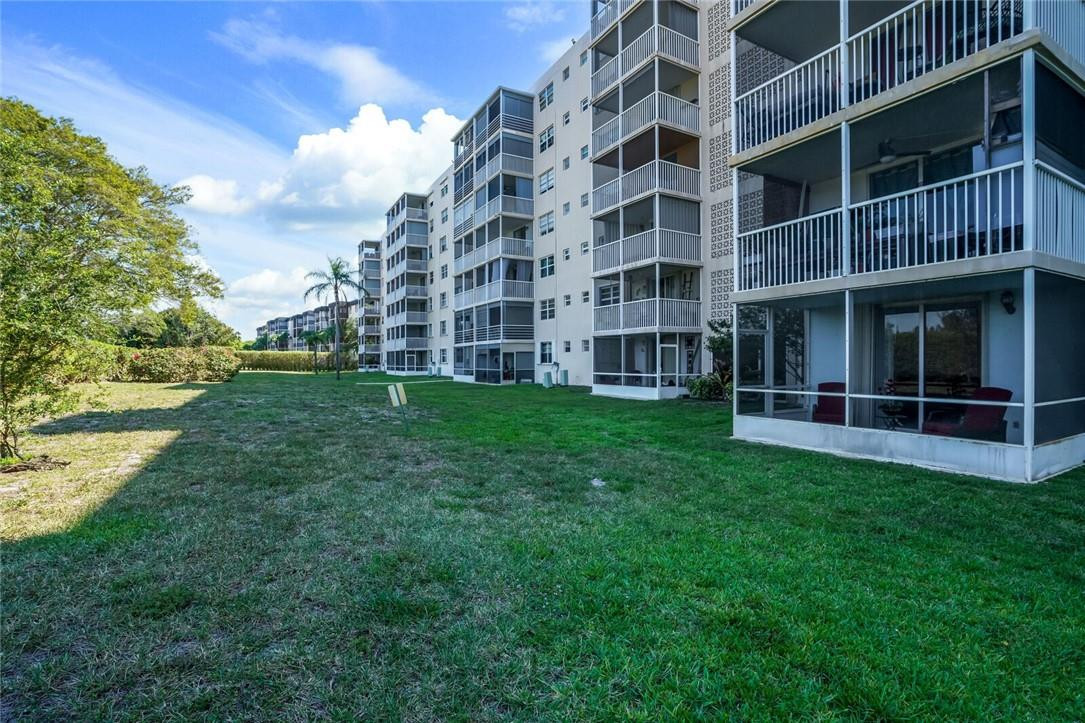 5500 Northwest 2nd Avenue, Unit 119 Boca Raton, FL 33487 - Photo 22 of 22 a view of building with yard