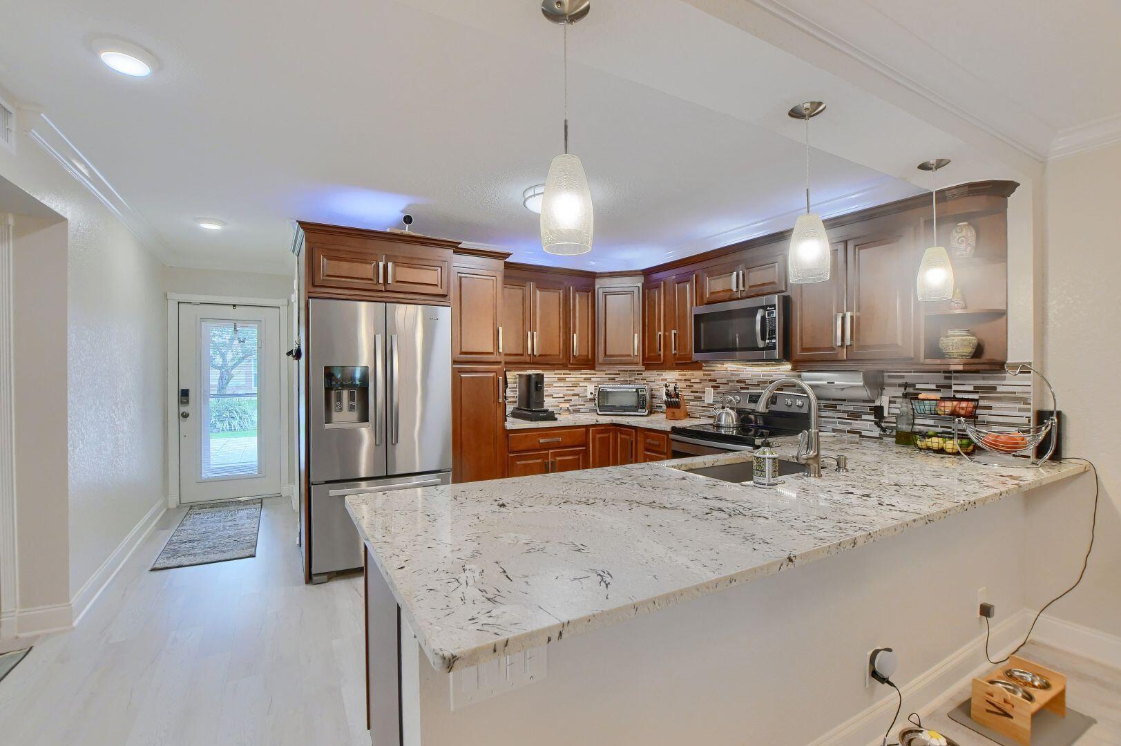 9005 Flynn Circle, Unit 7 Boca Raton, FL 33496 - Photo 4 of 44 17de8b59f42996891ed3741245472088_1780591