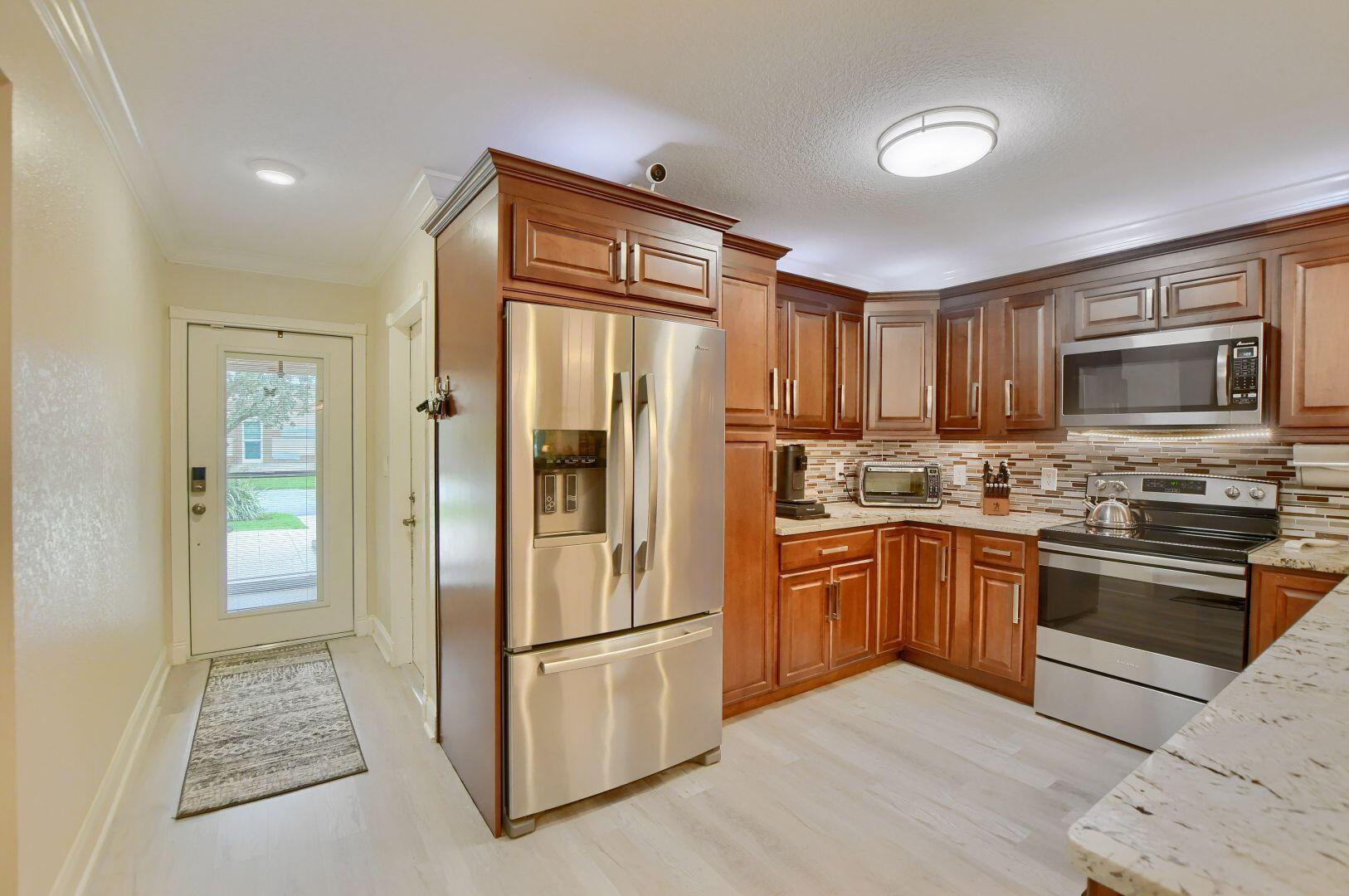 9005 Flynn Circle, Unit 7 Boca Raton, FL 33496 - Photo 6 of 44 b131e95b258284fccf835a43035f0df9_1780589