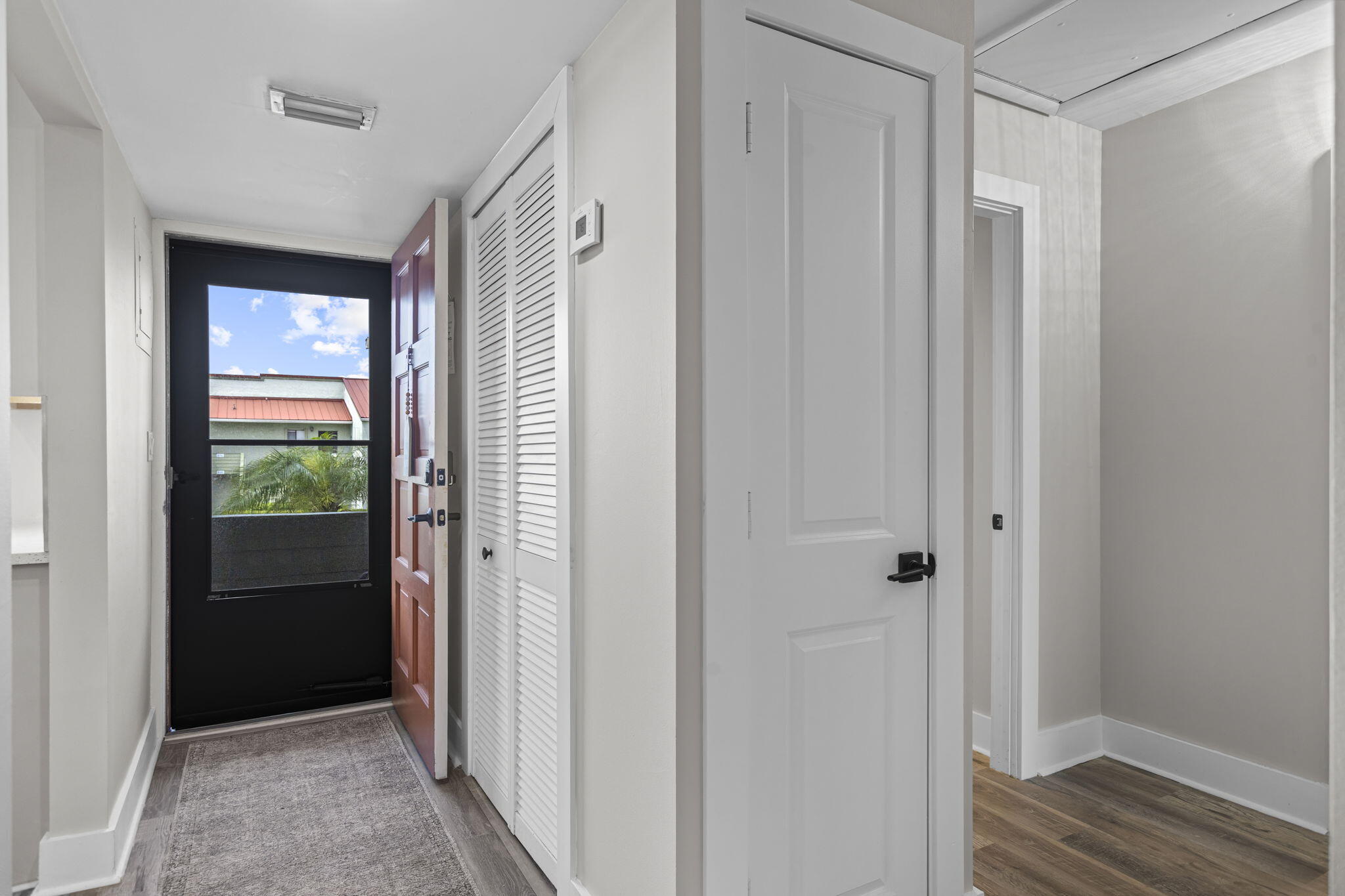 5433 Southeast Miles Grant Road, Unit 201 Stuart, FL 34997 - Photo 6 of 25 15-web-or-mls-0V8A4601Topaz