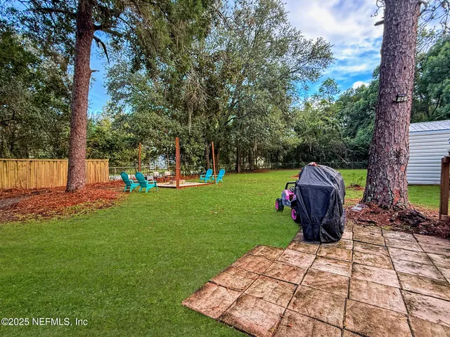 a view of a garden with a slide