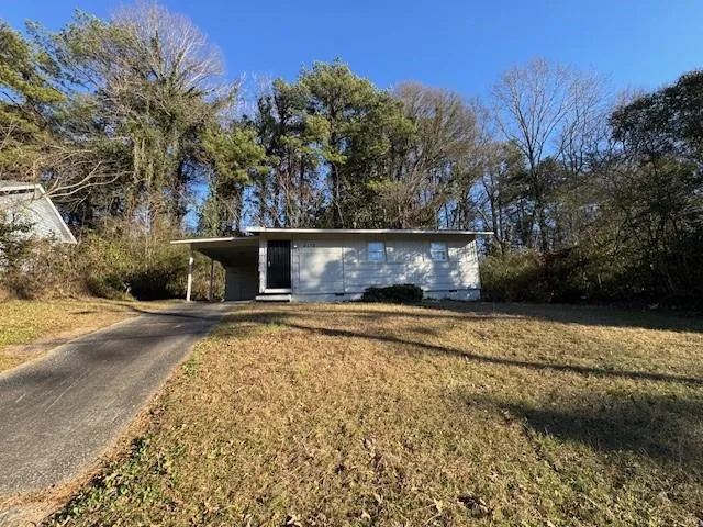 a view of a yard with an outdoor space