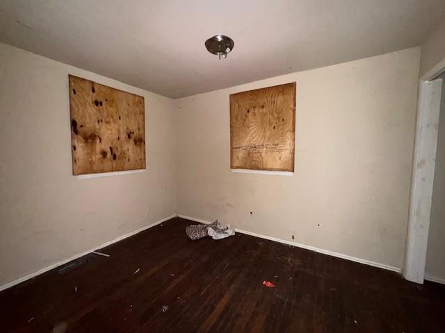 2118 Kipling Circle Southeast Atlanta, GA 30315 - Photo 10 of 11 a view of a hallway with wooden floor and a cabinet