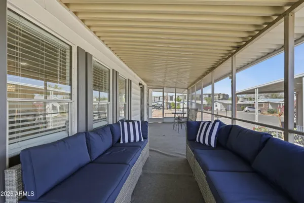 a balcony with furniture