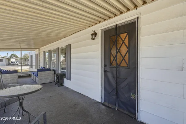 a porch with seating space