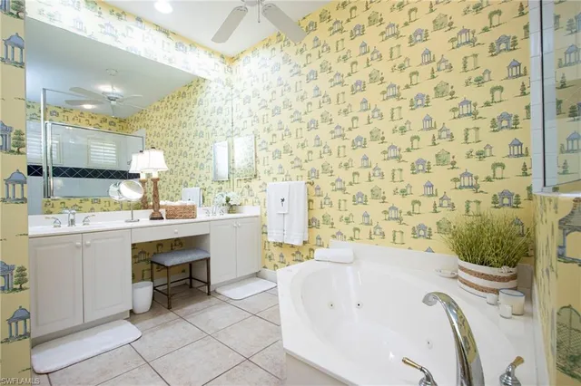 a bathroom with a sink a bathtub and a sink