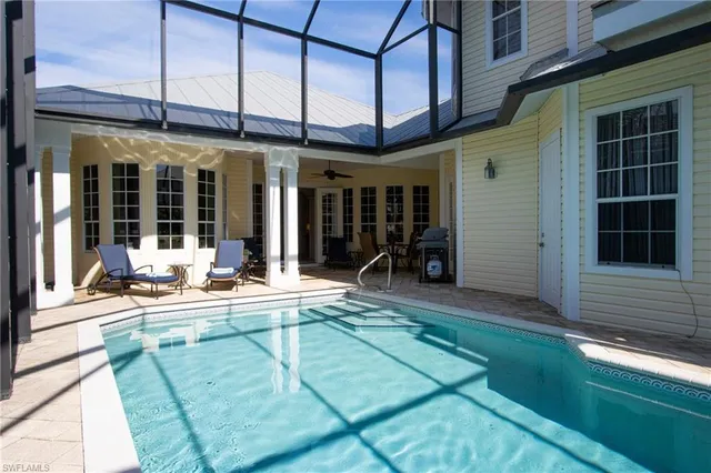 a view of a building with sitting area