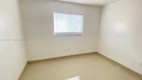 a view of a room with an empty space