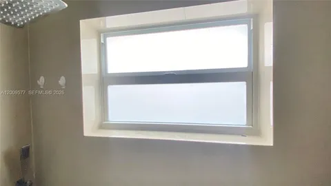 a bathroom with a window