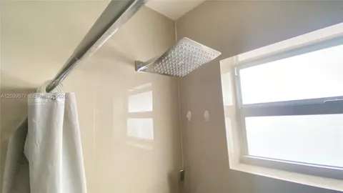 a bathroom with a mirror