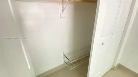 a bathroom with a toilet and sink