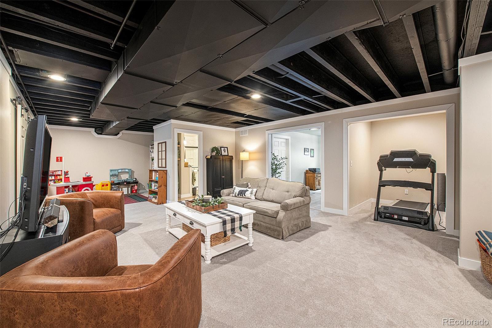 320 Granite Way Johnstown, CO 80534 - Photo 20 of 39 a living room with furniture
