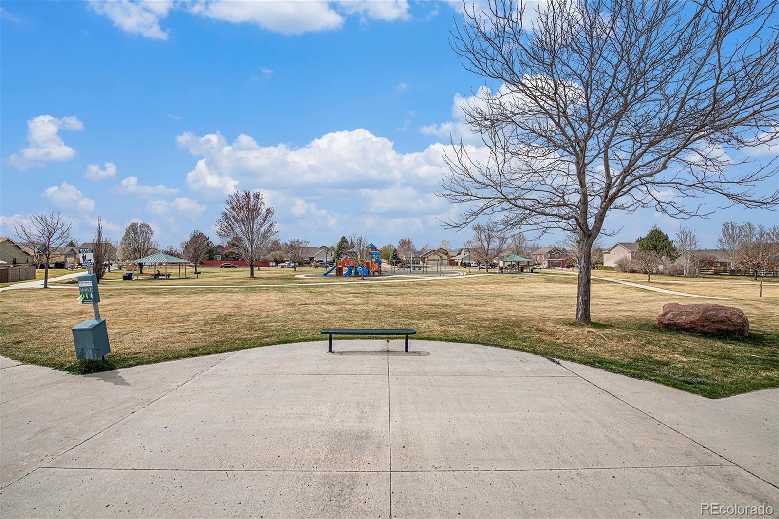 320 Granite Way Johnstown, CO 80534 - Photo 35 of 39 a view of a park with large trees