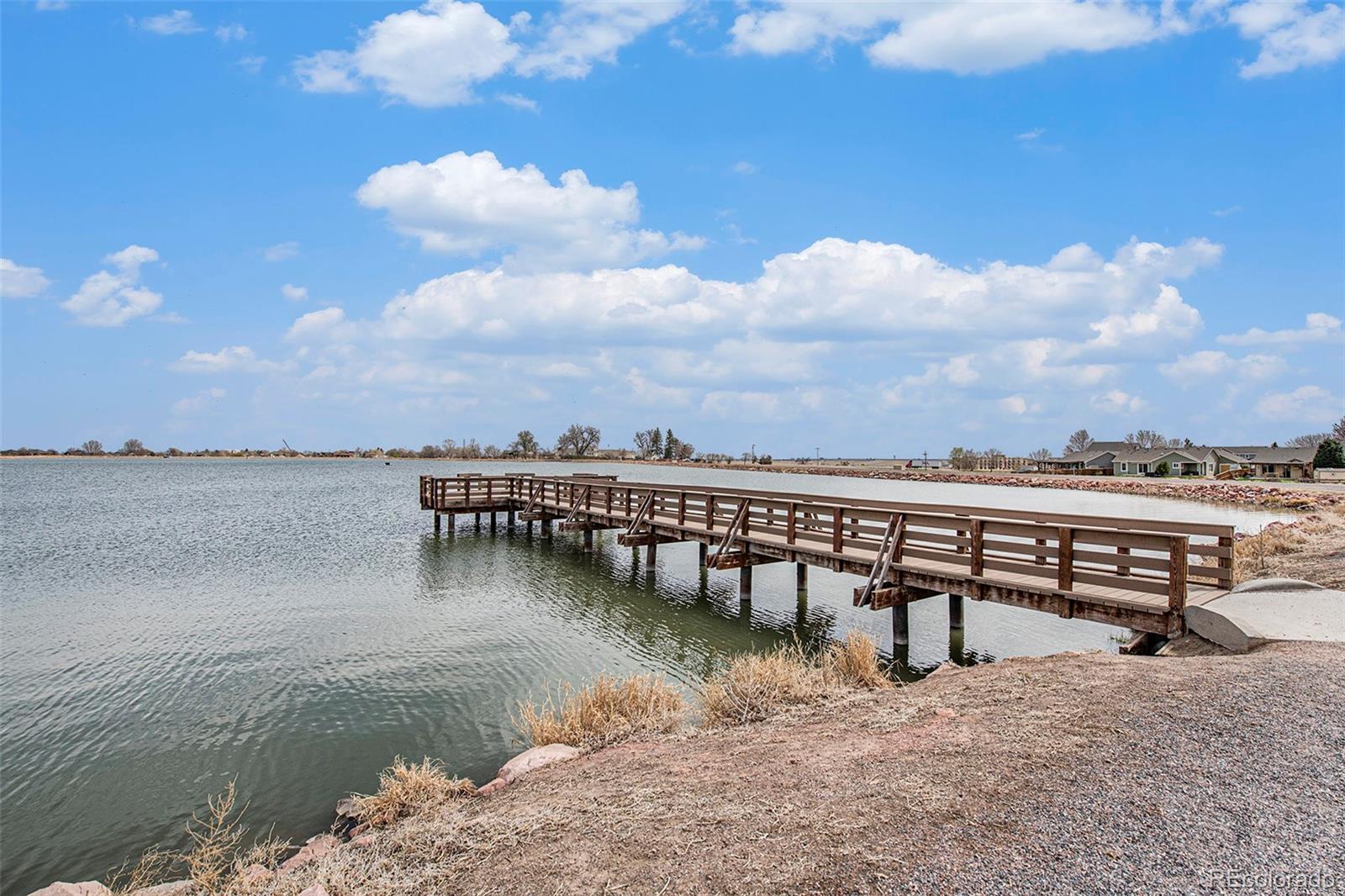 320 Granite Way Johnstown, CO 80534 - Photo 38 of 39 a view of a lake