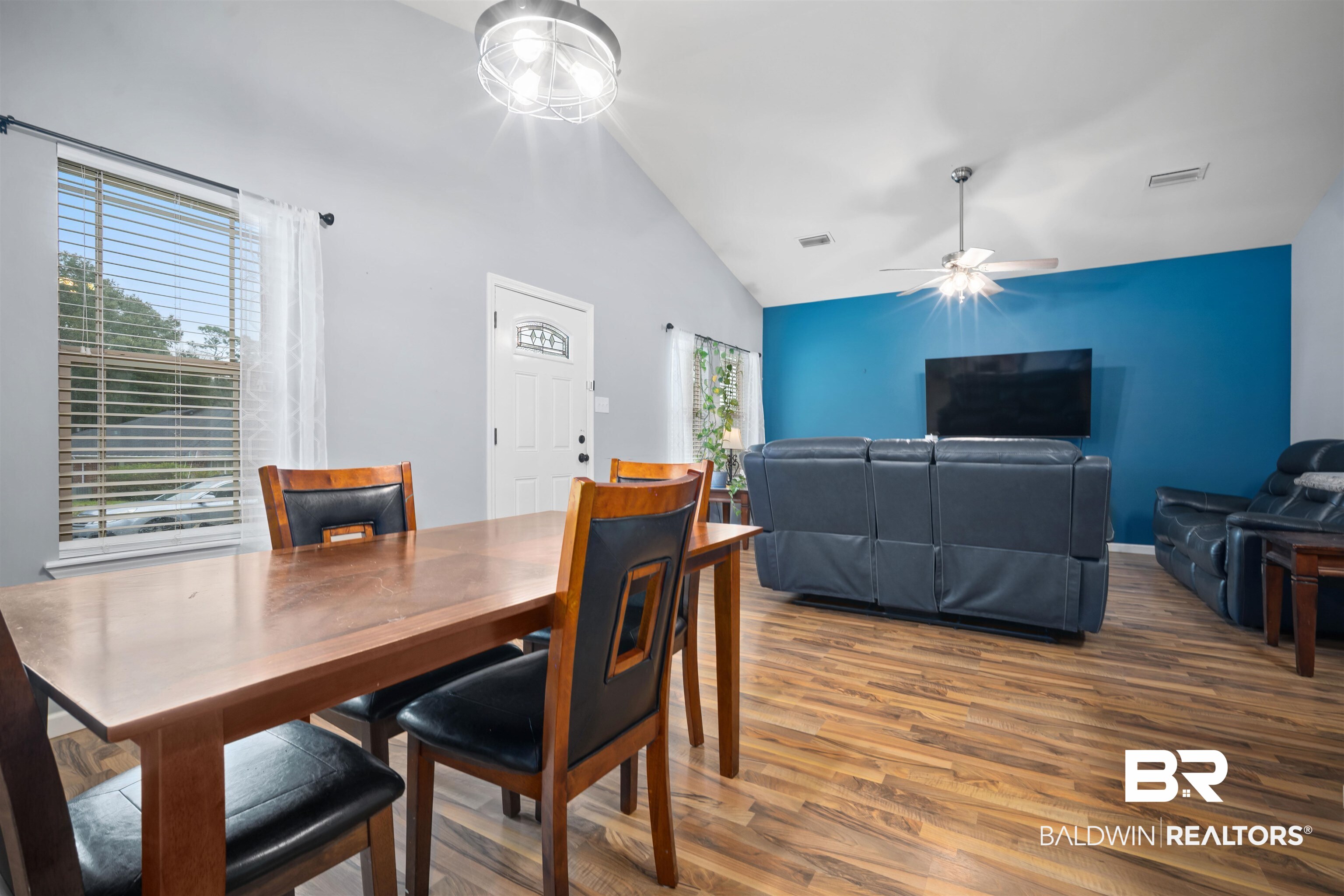 209 Maplewood Loop Daphne, AL 36526 - Photo 10 of 23 Dining space with wood finished floors and vaulted ceiling