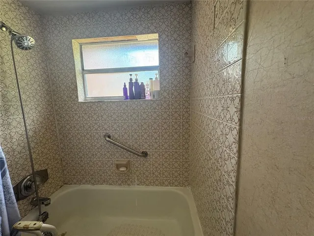 a bathroom with a bathtub