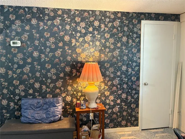 a room with a table and chairs