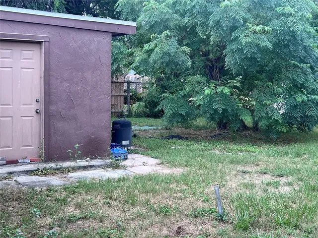 a view of outdoor space and yard