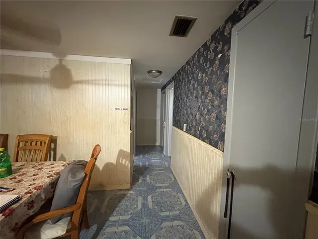 a view of livingroom with furniture and wooden floor