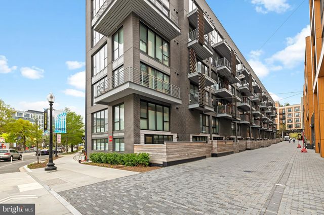 a view of a building with a street