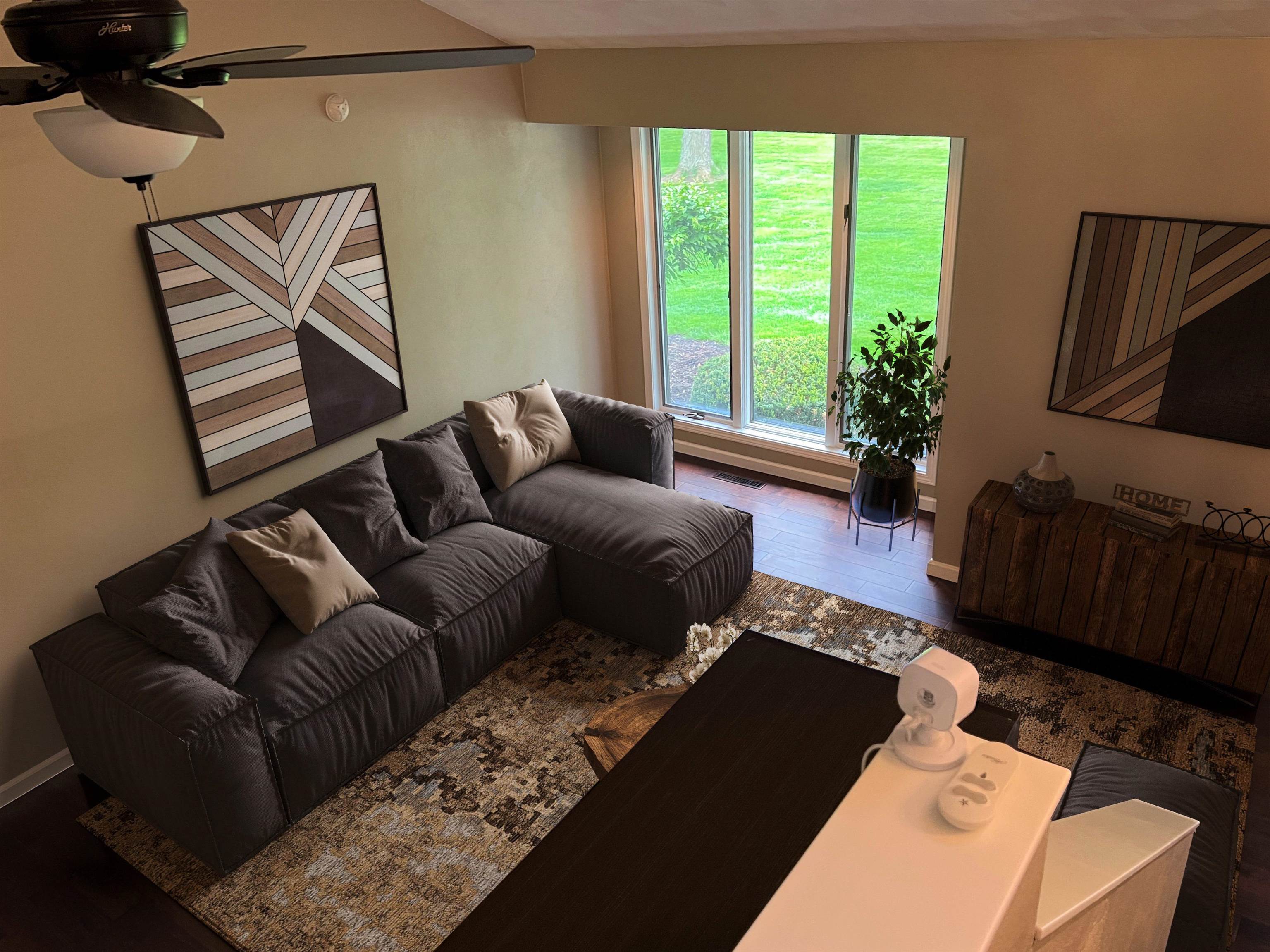 14 Spring Brook Road Rockford, IL 61114 - Photo 12 of 31 a living room with furniture and a flat screen tv