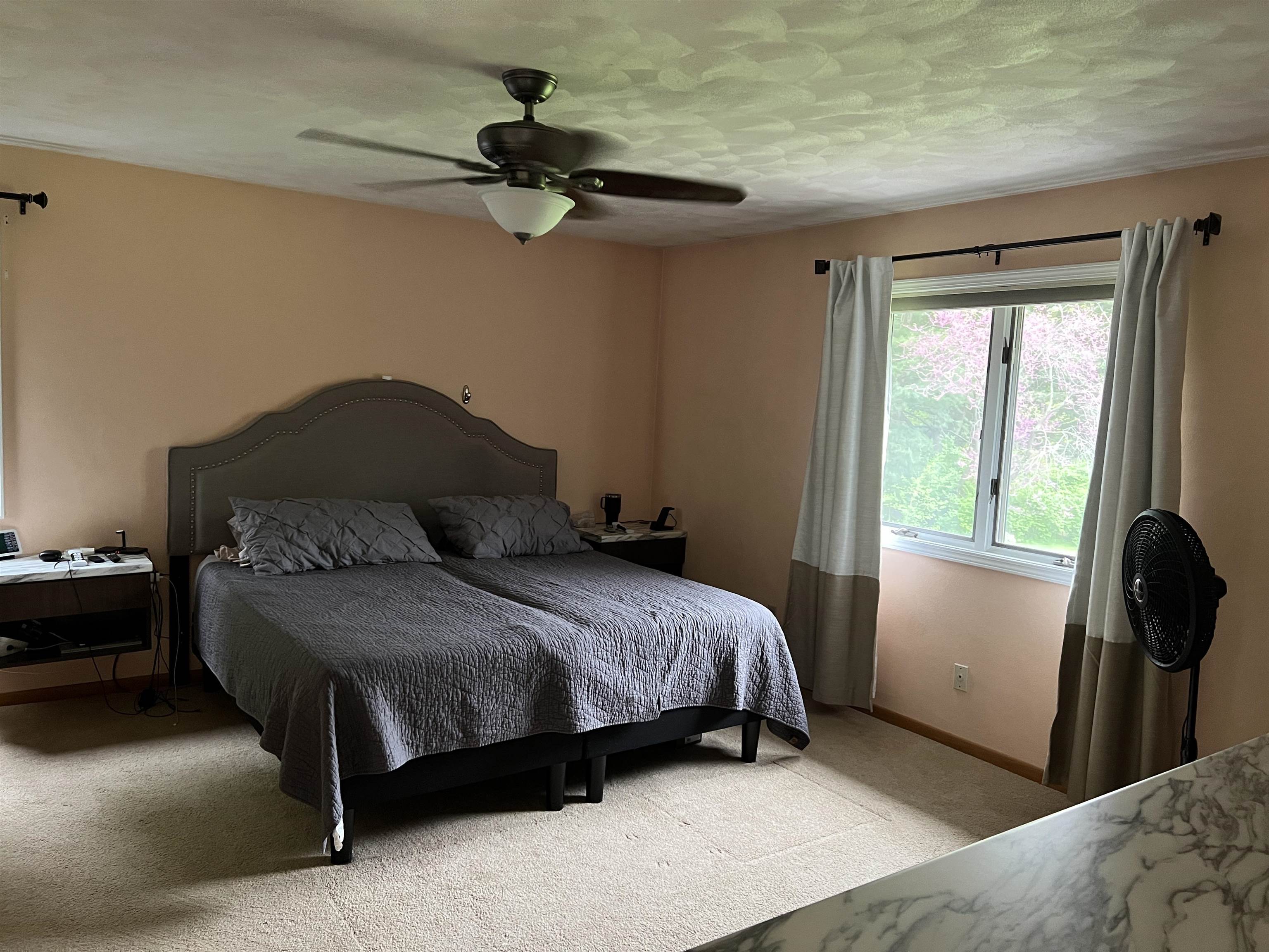 14 Spring Brook Road Rockford, IL 61114 - Photo 17 of 31 a bedroom with a bed and a window