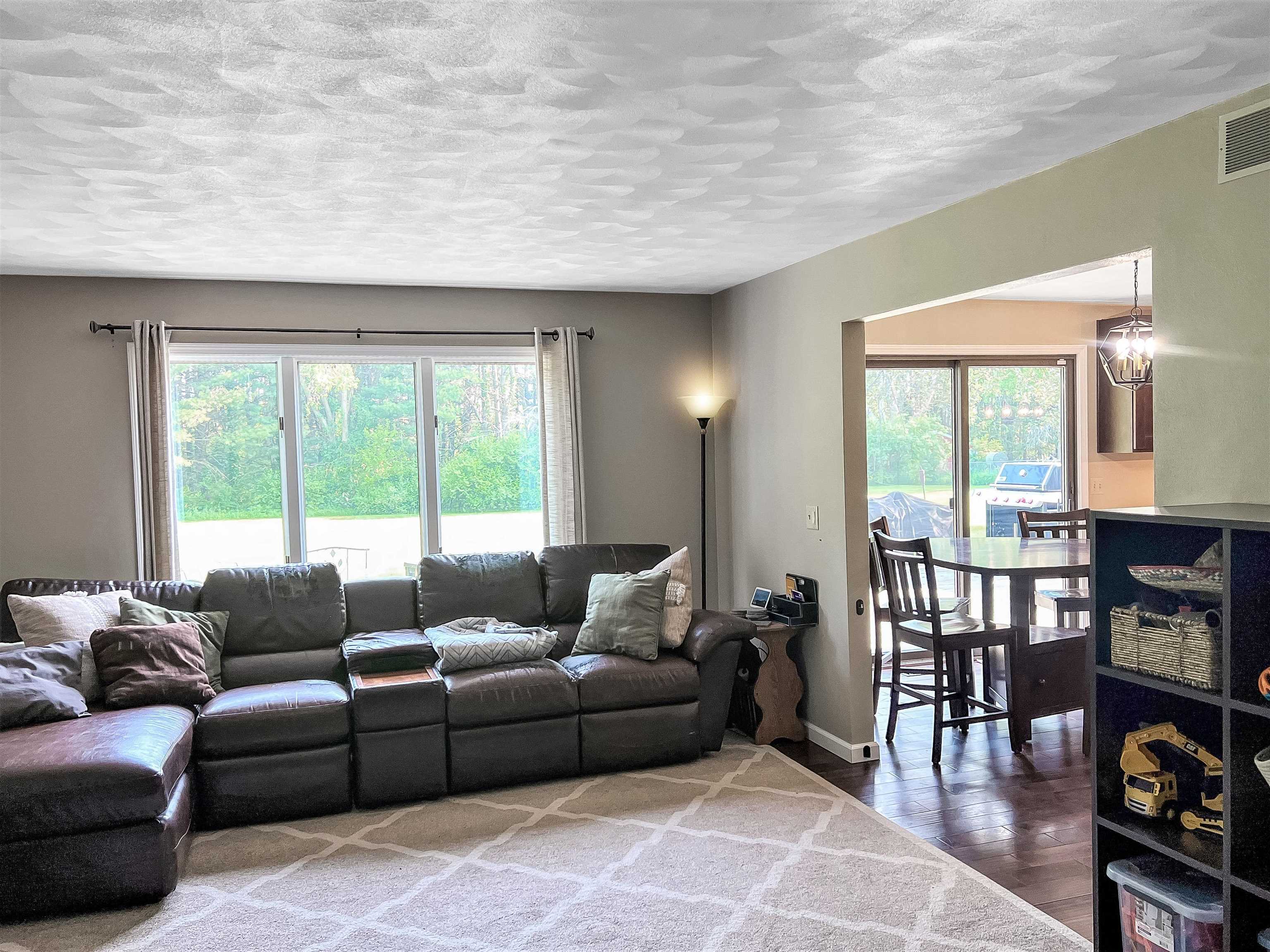 14 Spring Brook Road Rockford, IL 61114 - Photo 23 of 31 a living room with furniture and a large window