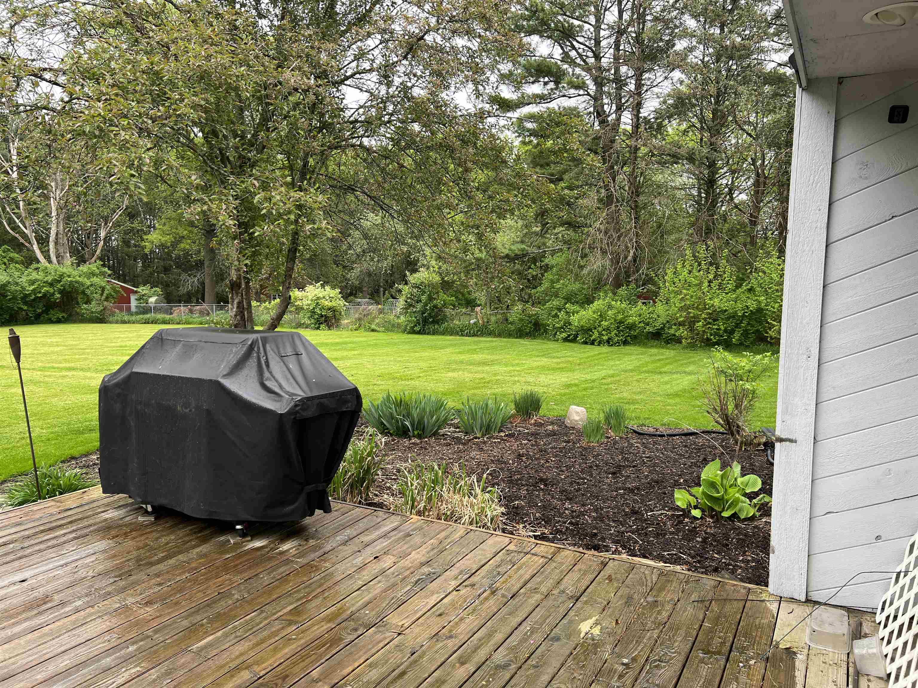 14 Spring Brook Road Rockford, IL 61114 - Photo 29 of 31 a view of a backyard with wooden floor