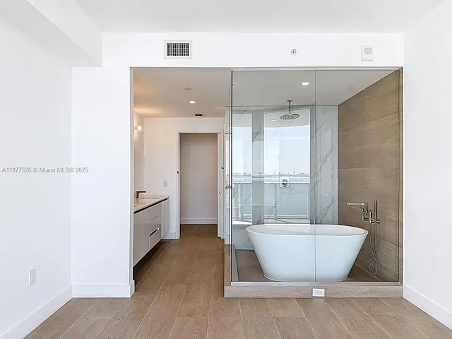 a view of a balcony with an outdoor space and seating