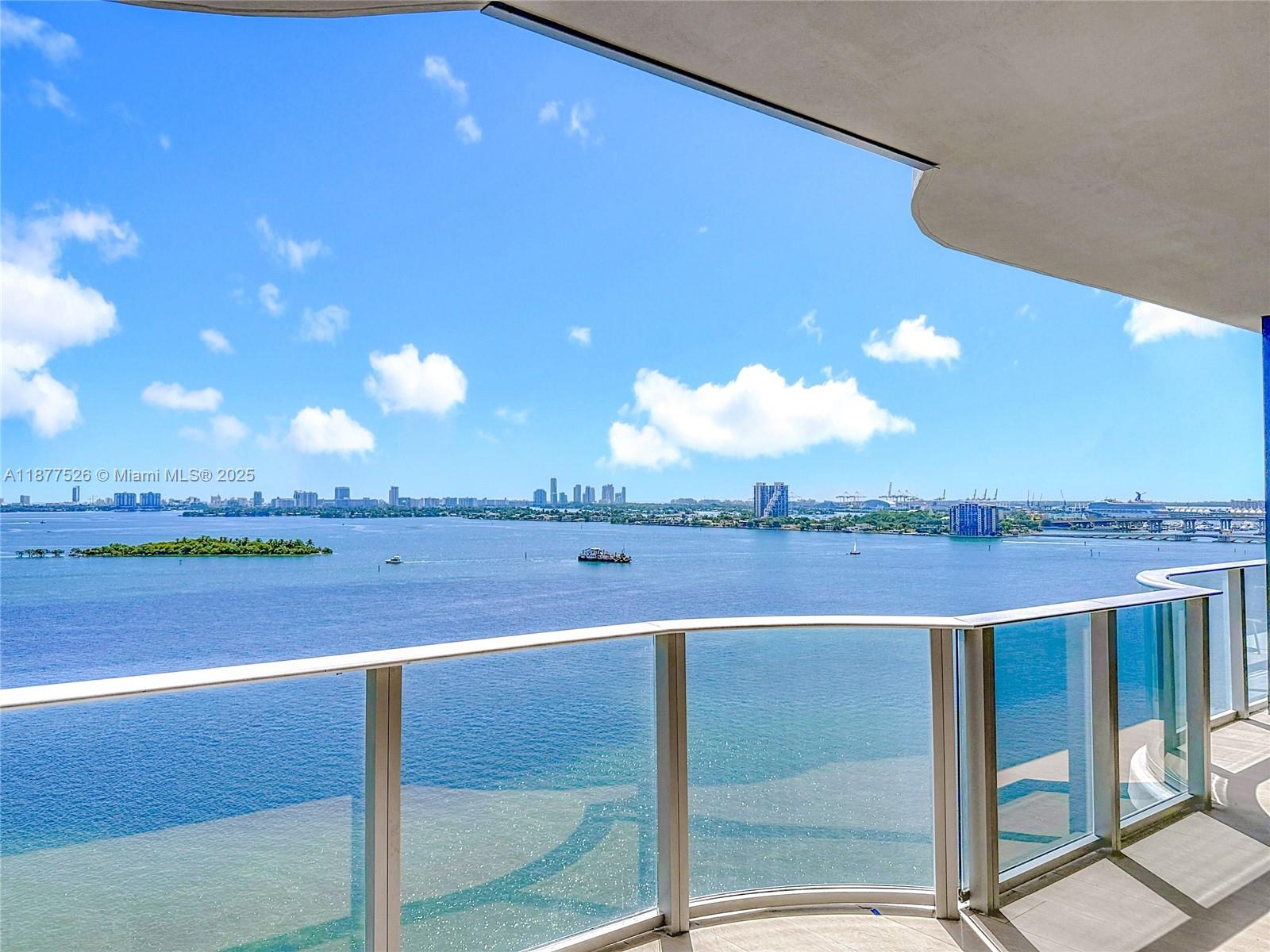 700 Northeast 24th Street, Unit 1402 Miami, FL 33137 - Photo 18 of 68 a view of a balcony with an outdoor space and seating